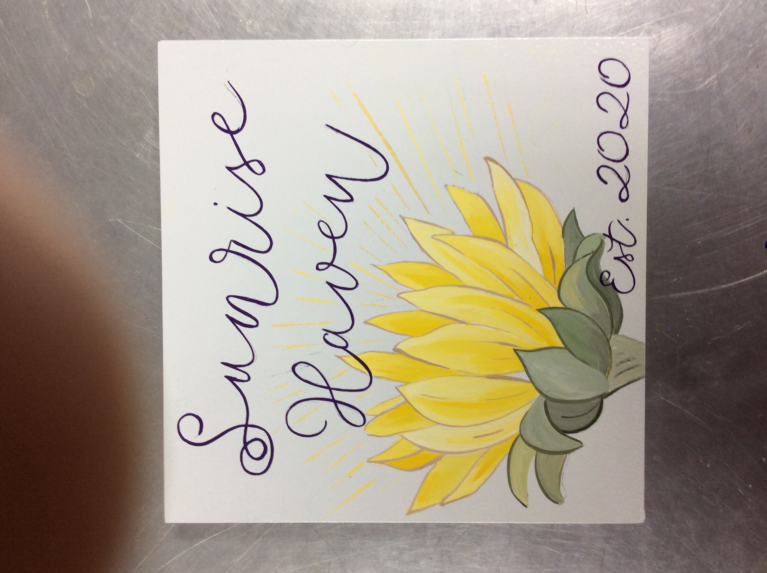 Hand-painted home sign example