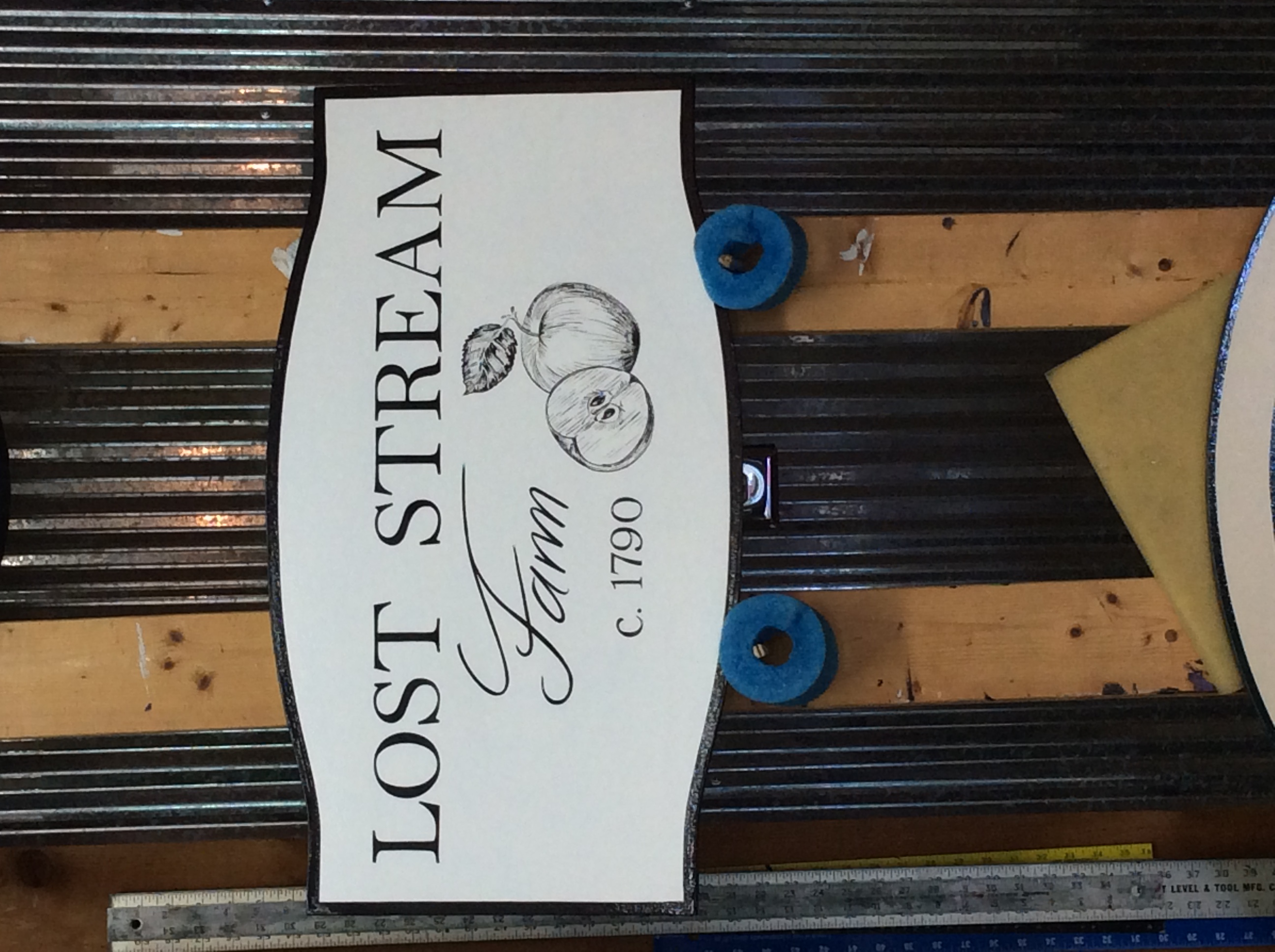 Hand-painted barn sign example